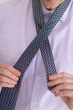 Load image into Gallery viewer, silk men's tie Scissortail Oklahoma microprint design in Navy with white birds and orange accents