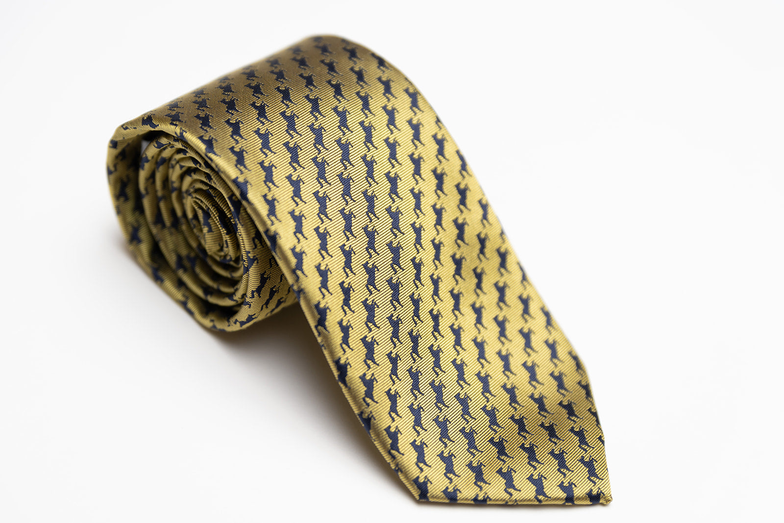 UCO gold and navy broncho silk tie