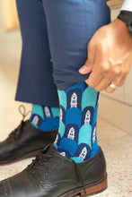 Load image into Gallery viewer, man pulling up sock- UCO old north sock
