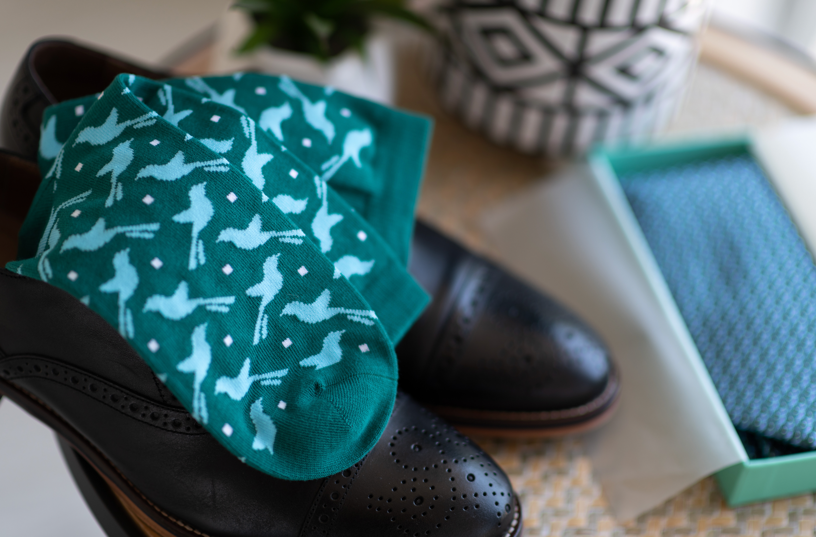 green men's socks with Oklahoma scissortail and black dress shoe